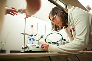 Female student working in science lab